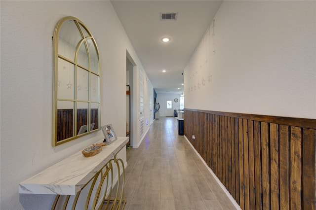 5723 Morning Vista Rd, Katy, TX 77493 - hall with a wainscoted wall, light wood-type flooring, visible vents, and recessed lighting