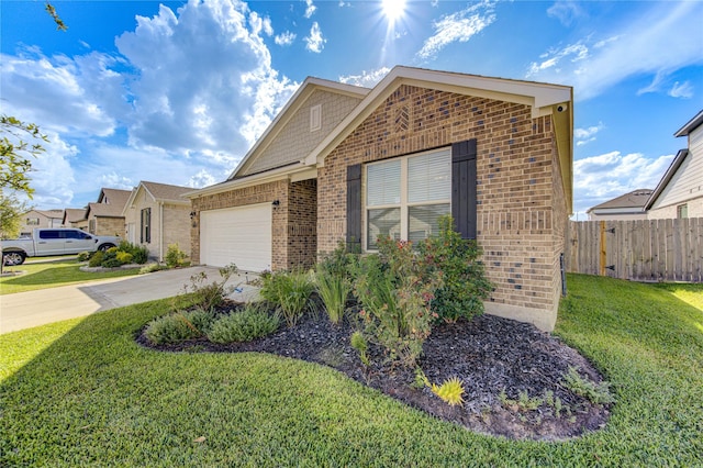 ranch-style home with brick siding, concrete driveway, an attached garage, fence, and a front yard