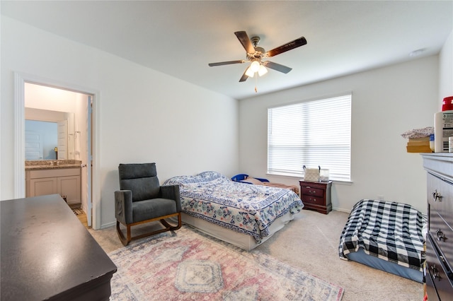5723 Morning Vista Rd, Katy, TX 77493 - bedroom with light carpet, ensuite bath, baseboards, and a ceiling fan