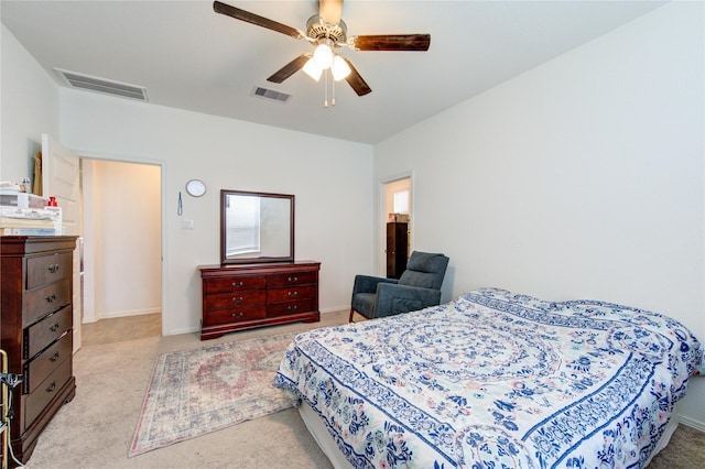 5723 Morning Vista Rd, Katy, TX 77493 - bedroom featuring light carpet, ceiling fan, visible vents, and baseboards