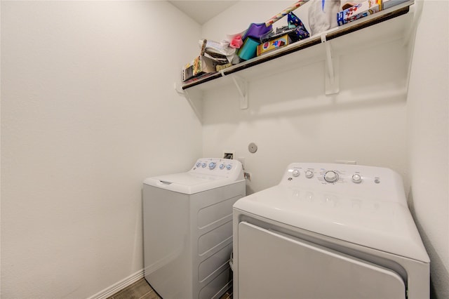 5723 Morning Vista Rd, Katy, TX 77493 - washroom featuring laundry area, washing machine and dryer, and baseboards