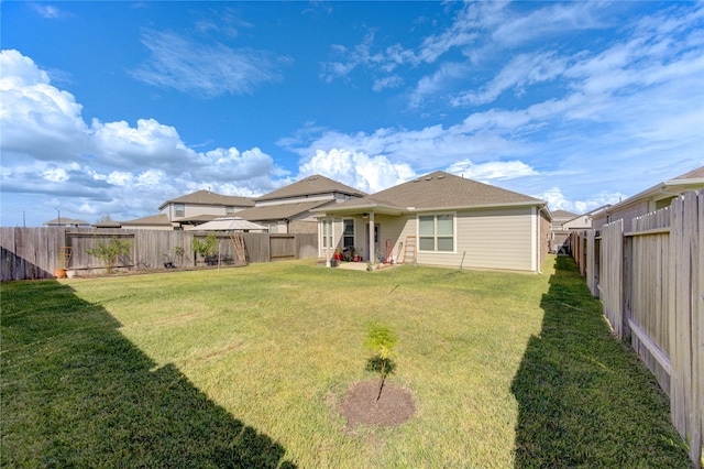 5723 Morning Vista Rd, Katy, TX 77493 - back of house featuring a yard and a fenced backyard