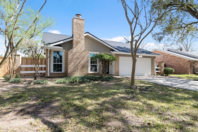 view of front of property with a garage, brick siding, fence, driveway, and a chimney