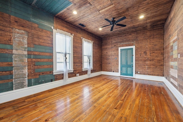 unfurnished room with recessed lighting, a ceiling fan, wooden ceiling, baseboards, and hardwood / wood-style flooring