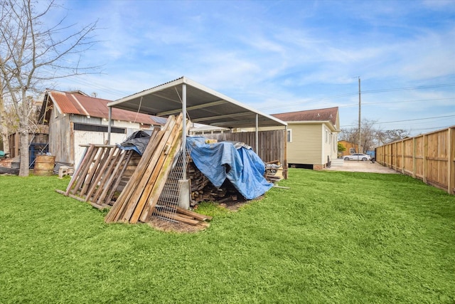 exterior space featuring fence and a yard