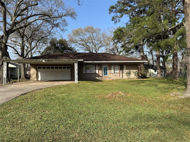 single story home with a garage, driveway, a front yard, and fence