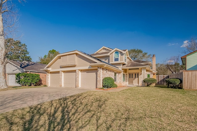 view of front of home featuring brick siding, fence, concrete driveway, a chimney, and a front yard