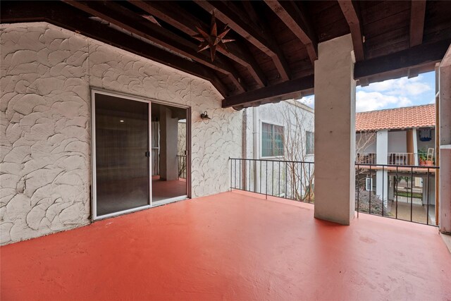 view of patio / terrace with a balcony