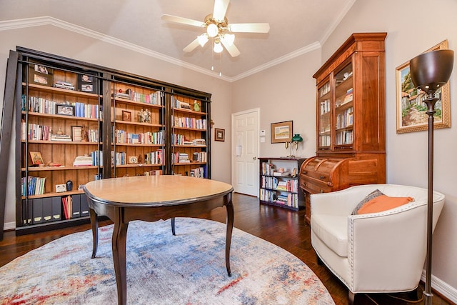 living area with lofted ceiling, a ceiling fan, dark wood-style floors, crown molding, and baseboards