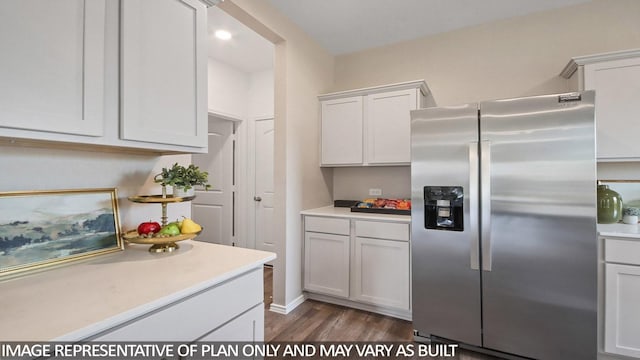 1506 Portia Ct, Conroe, TX 77301 - kitchen with stainless steel refrigerator with ice dispenser, light countertops, dark wood finished floors, and white cabinetry