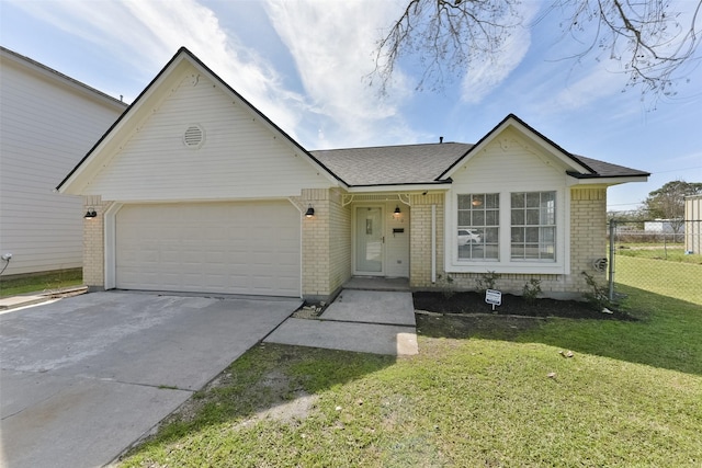 view of front of house with brick siding, roof with shingles, a garage, driveway, and a front lawn