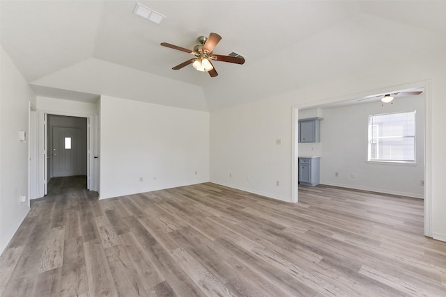 unfurnished living room with ceiling fan, visible vents, and light wood-style flooring