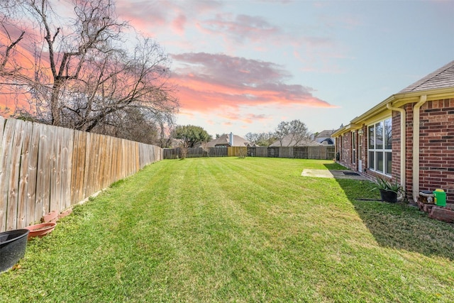 view of yard featuring a fenced backyard