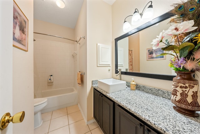 bathroom featuring shower / tub combo, baseboards, toilet, tile patterned floors, and vanity