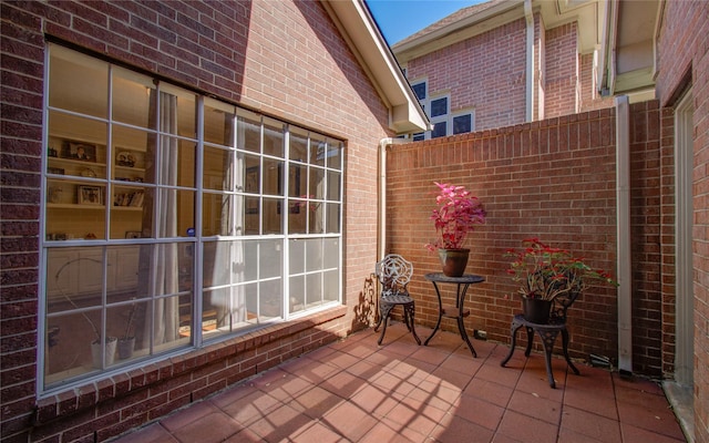 view of patio / terrace featuring fence