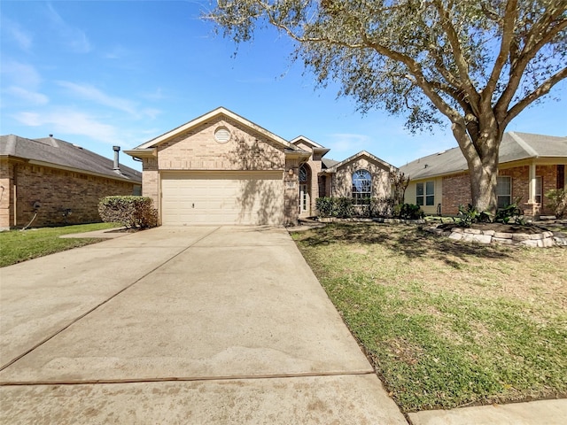 ranch-style house with brick siding, an attached garage, driveway, and a front lawn