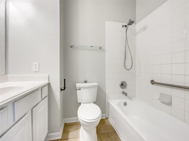 full bathroom with vanity, baseboards, shower / bath combination, tile patterned floors, and toilet