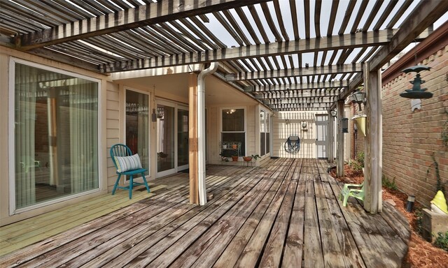 wooden terrace with a pergola