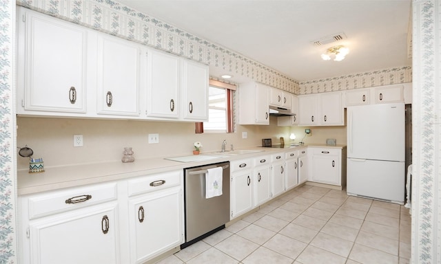 kitchen with visible vents, dishwasher, freestanding refrigerator, black electric stovetop, and under cabinet range hood