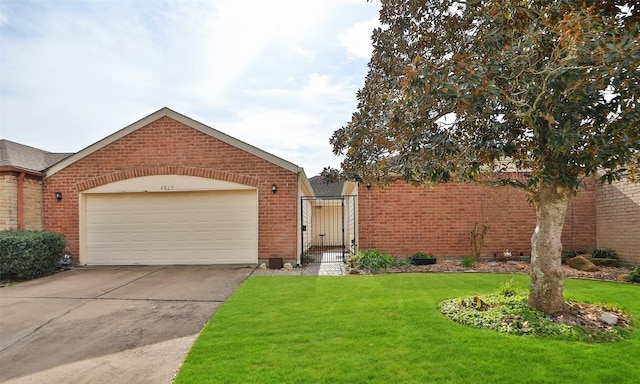 view of front facade with a garage, driveway, a gate, a front lawn, and brick siding