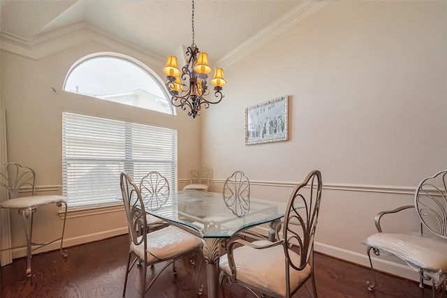 dining room with ornamental molding, baseboards, dark wood-style flooring, and a chandelier