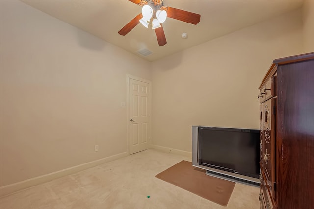 interior space featuring visible vents, baseboards, and a ceiling fan