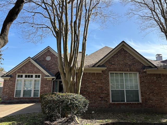 view of front of property with brick siding