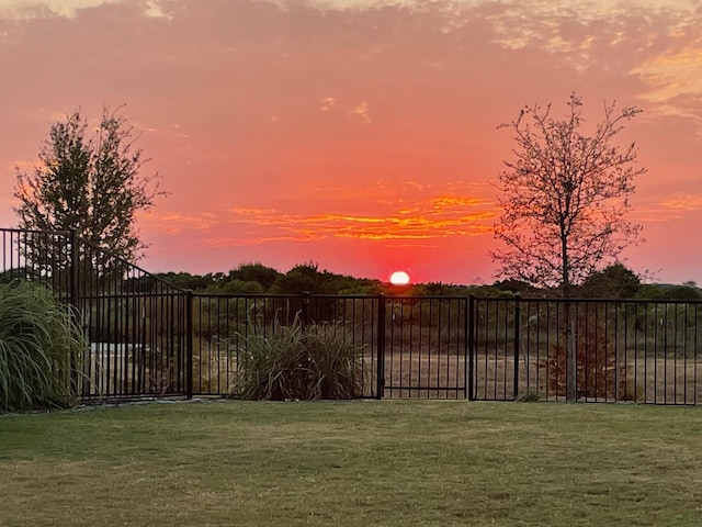 yard at dusk with fence