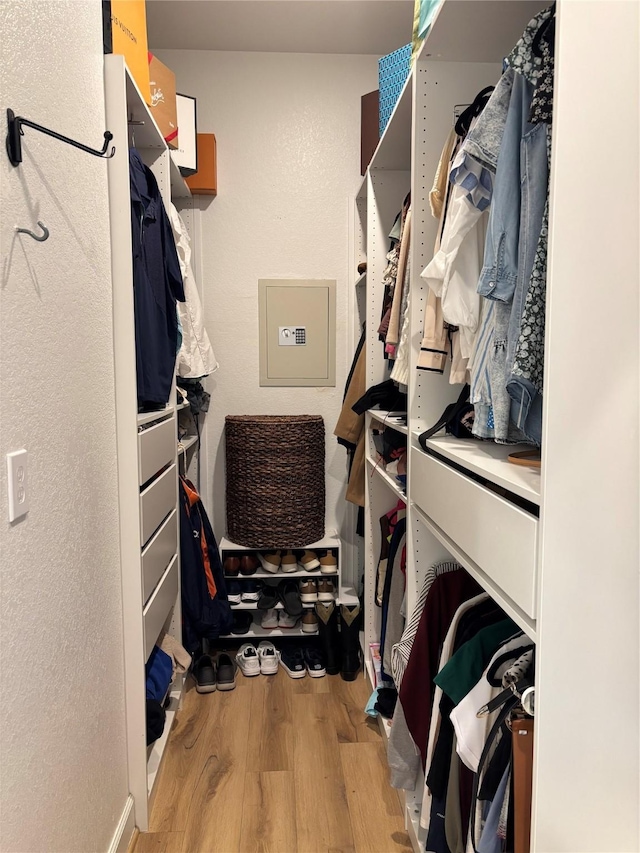 spacious closet with wood finished floors