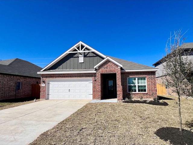 view of front facade with a garage, driveway, brick siding, and board and batten siding