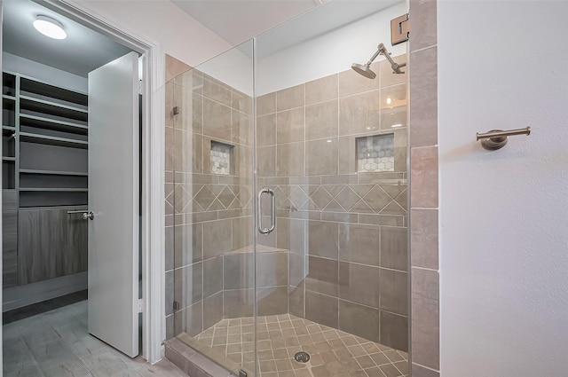 full bath with a shower stall