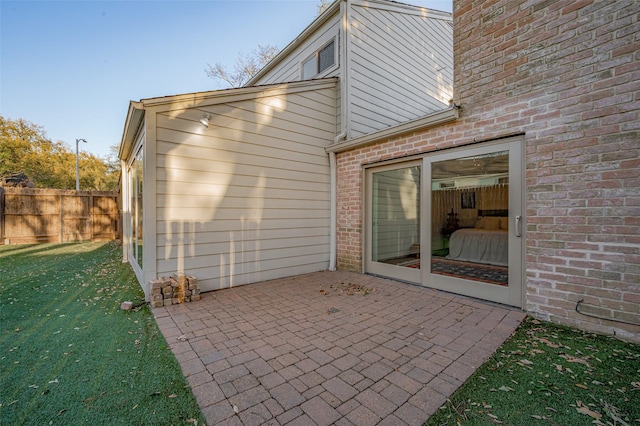 view of patio / terrace featuring fence