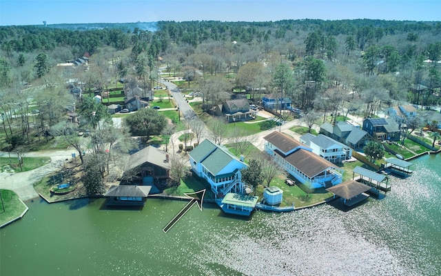 birds eye view of property featuring a residential view and a water view