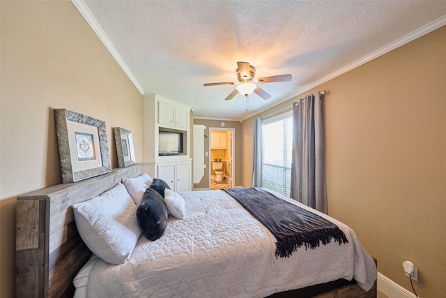 bedroom with crown molding, ceiling fan, baseboards, a textured ceiling, and ensuite bath