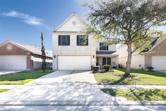 traditional home featuring brick siding, concrete driveway, and a front yard