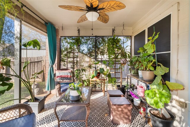 sunroom / solarium with ceiling fan