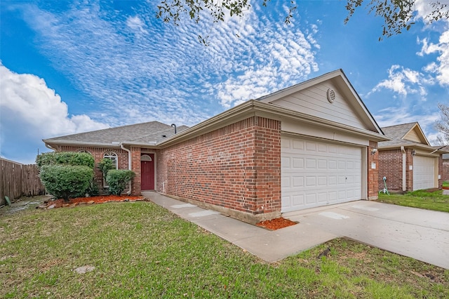 single story home with a garage, brick siding, fence, driveway, and a front yard