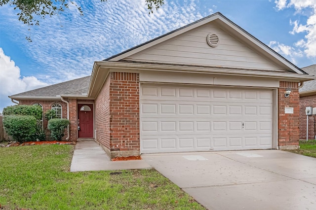 ranch-style home with brick siding, a shingled roof, concrete driveway, an attached garage, and a front lawn