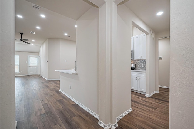 19430 Mystic Cypress Dr, Katy, TX 77449 - corridor with dark wood-type flooring, visible vents, baseboards, and recessed lighting