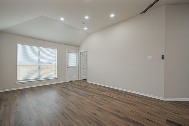 unfurnished room featuring visible vents, baseboards, dark wood-type flooring, vaulted ceiling, and recessed lighting