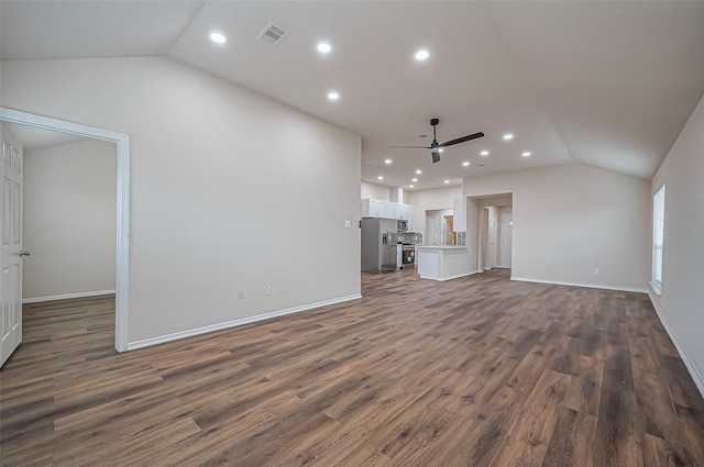 19430 Mystic Cypress Dr, Katy, TX 77449 - unfurnished living room featuring vaulted ceiling, a ceiling fan, dark wood-type flooring, visible vents, and recessed lighting