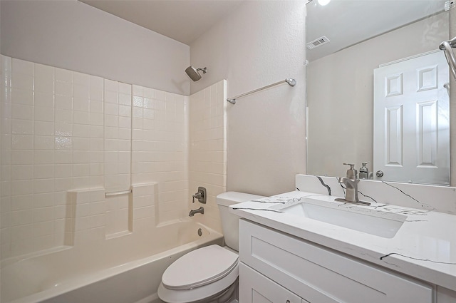 full bathroom with toilet, vanity, visible vents, and shower / bathtub combination