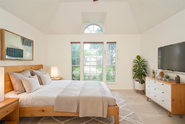 bedroom featuring vaulted ceiling