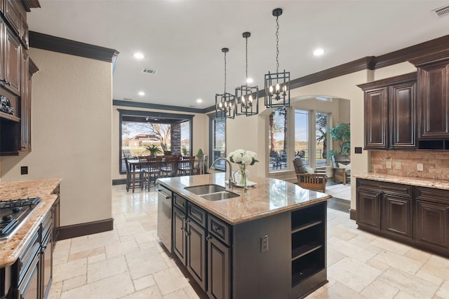 kitchen featuring open shelves, arched walkways, stone tile flooring, stainless steel appliances, and a sink