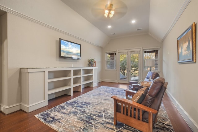 sitting room with visible vents, wood finished floors, baseboards, french doors, and lofted ceiling