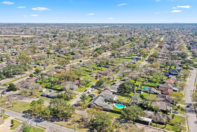 birds eye view of property with a residential view