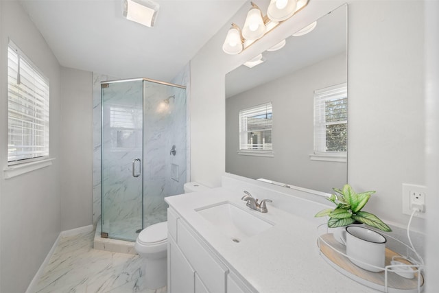 full bath with a marble finish shower, baseboards, toilet, marble finish floor, and vanity