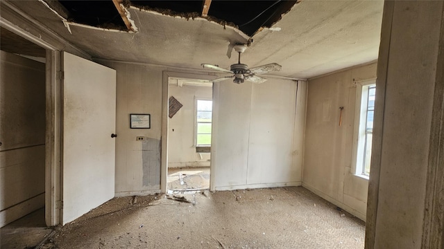 empty room with a ceiling fan