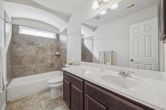 full bath with toilet, bathing tub / shower combination, vanity, and visible vents