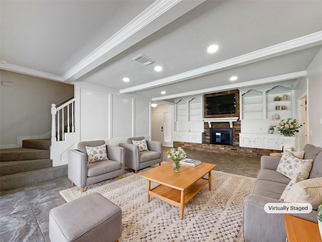 living room with visible vents, a brick fireplace, crown molding, built in features, and stairs